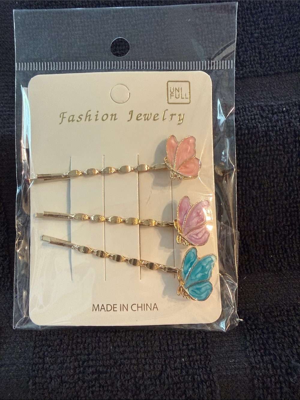 UNIF Gold Butterfly Bobby Pin Trio in Pink, Purple & Blue
